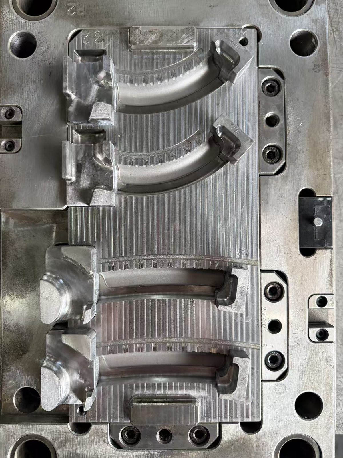 Close-up of mold core details for hand gripper parts