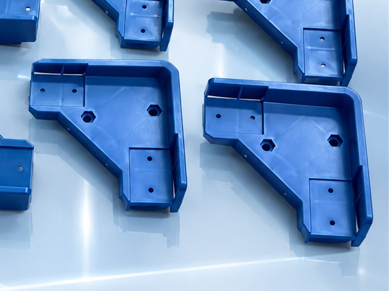 PP plastic corner protectors showing molded mounting holes and joint areas
